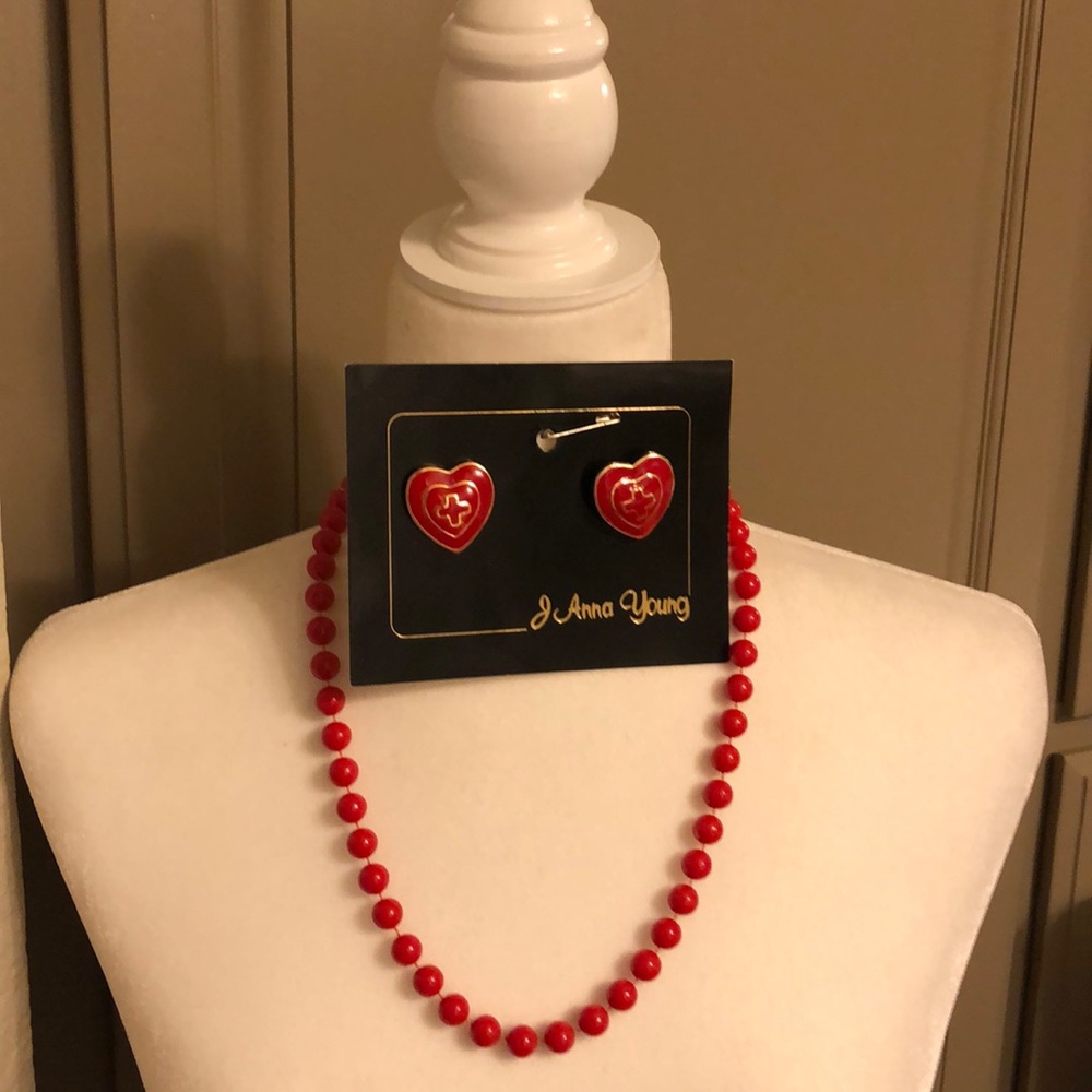 Red bead necklace and heart earrings